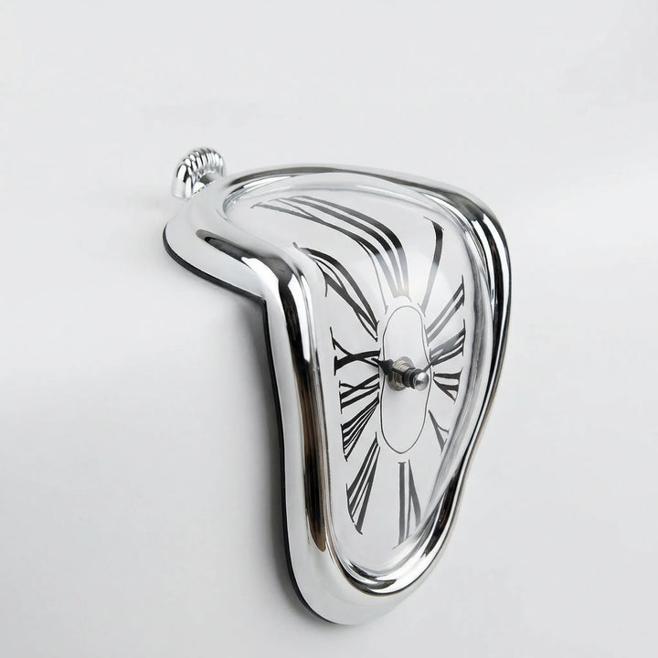 Modern artistic desk clock featuring a unique melted design, an abstract golden timepiece for shelf decor.