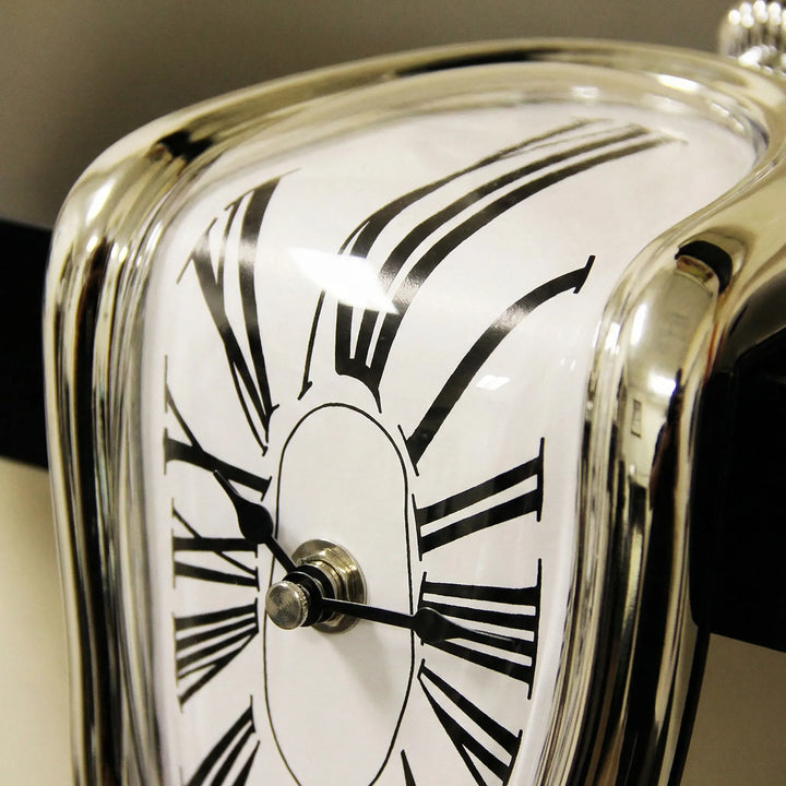 Elegant sculptural clock with a surreal melted look, a golden accent piece for contemporary home decor.