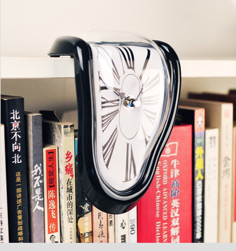 Unique desk clock with a melted sculptural design, an artistic and modern accent for home decor.