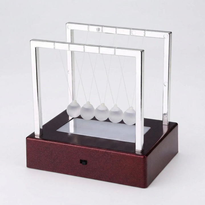 Abstract kinetic tabletop ornament, creating relaxing visual motion. Enhance your home office space.