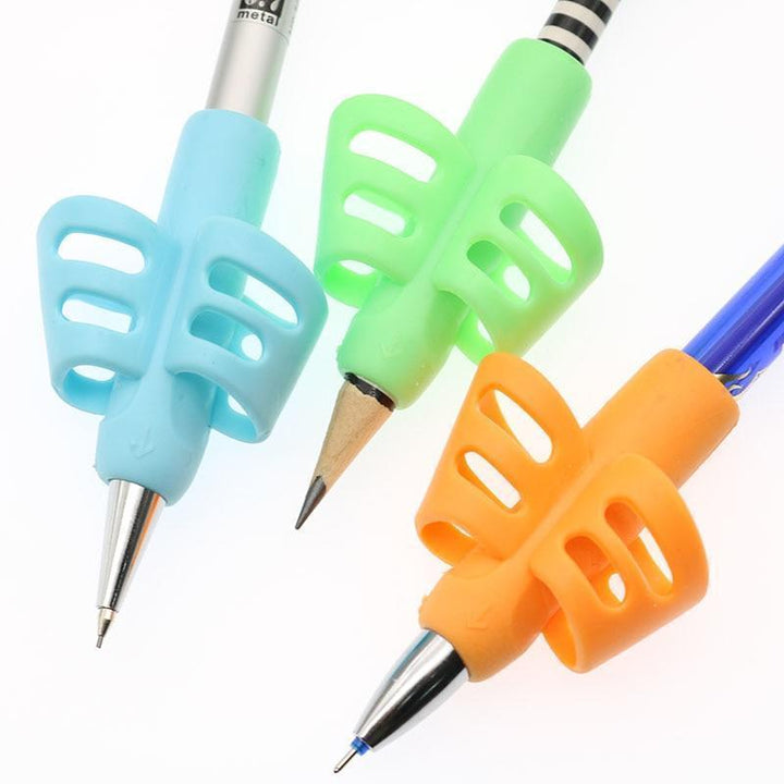 Close-up of a blue ergonomic pencil grip designed for children on a yellow pencil, improving writing posture.
