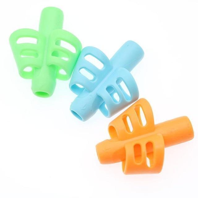 Pack of three kids' ergonomic pencil grips in various colors, essential school supplies for learning to write.