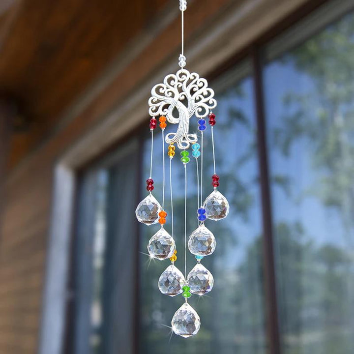 Detailed Tree of Life suncatcher with multi-faceted crystals, ideal for bright window display