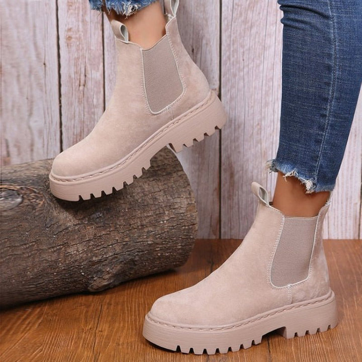 Chunky platform Chelsea ankle boots for women, ideal for casual and fashion-forward streetwear looks. Features elastic gussets.