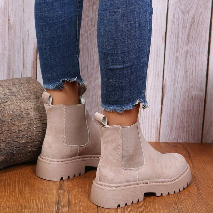 Fashionable women's platform Chelsea boots, designed for comfort and trendy streetwear. Features pull tab & chunky non-slip sole.
