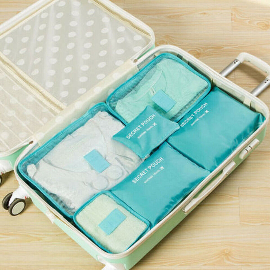 Empty 2-pack travel packing cube set. Ready to organize clothes & gear for your next vacation.