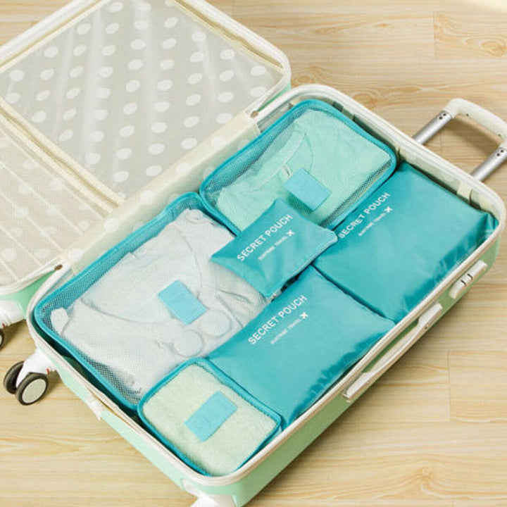 Empty 2-pack travel packing cube set. Ready to organize clothes & gear for your next vacation.