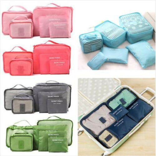 Versatile travel packing cubes in varied sizes. Efficient space saver luggage set for organized trips.