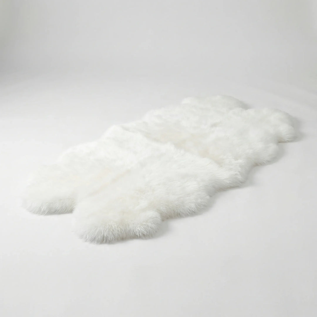 Flowique statement area rug, ultra plush and cloud-soft, featuring gentle waves for bedroom or living room.