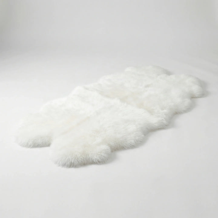 Flowique statement area rug, ultra plush and cloud-soft, featuring gentle waves for bedroom or living room.