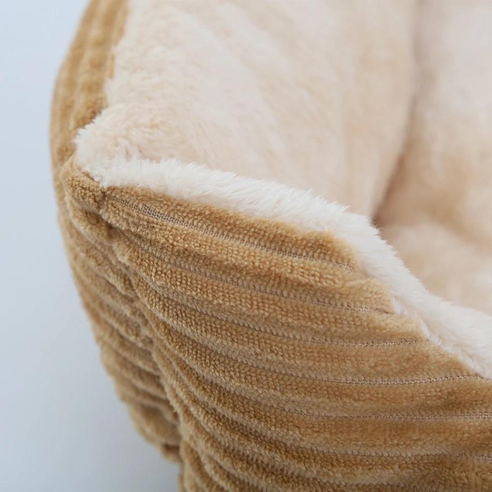 Cozy washable pet bed with ultra soft plush fabric. Non-slip design ensures safe, calming rest for your dog.