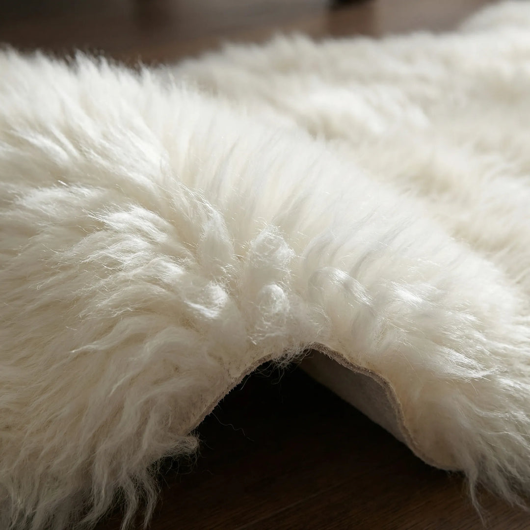 Plush faux fur throw rug, super soft and cozy, adding warmth and luxurious texture to any modern living space.