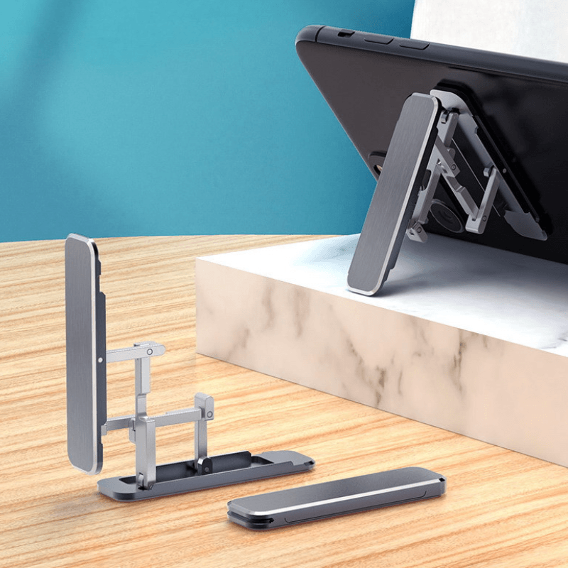 Compact and portable phone stand, ultra-thin design, universally compatible for smartphones, black finish.