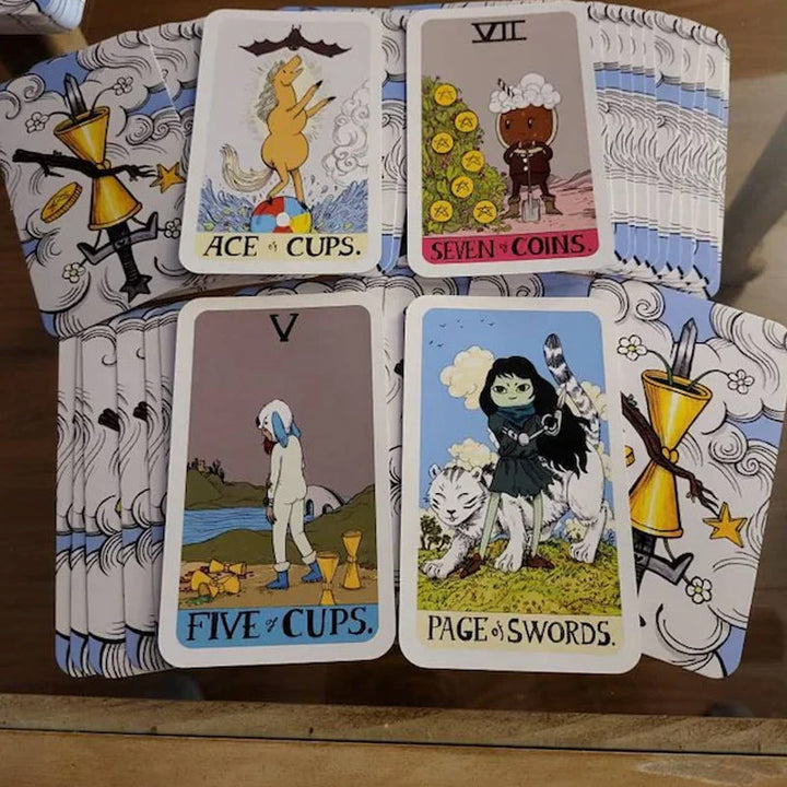 Unique tarot card deck on a wooden surface, ready for use in oracle and spiritual practices