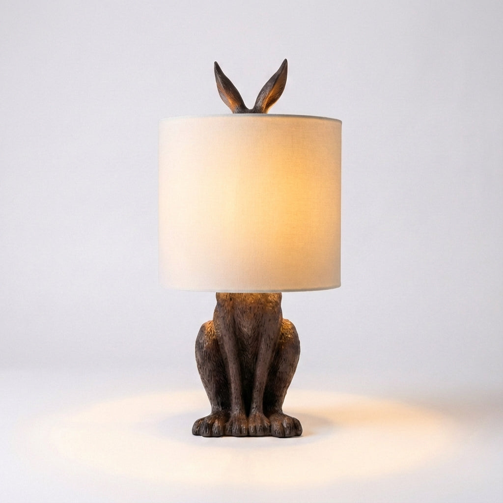 Elegant Noctebelle animal lamp, a unique sculptural piece providing warm ambient light for tables.