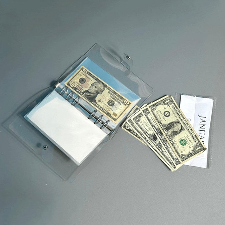 A hand placing cash into an envelope within the 12-Month Money Saving Challenge Binder system.