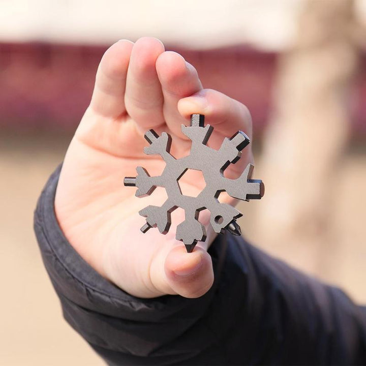 Portable 18-in-1 snowflake multi-tool, for attaching to keys or backpack as survival gear