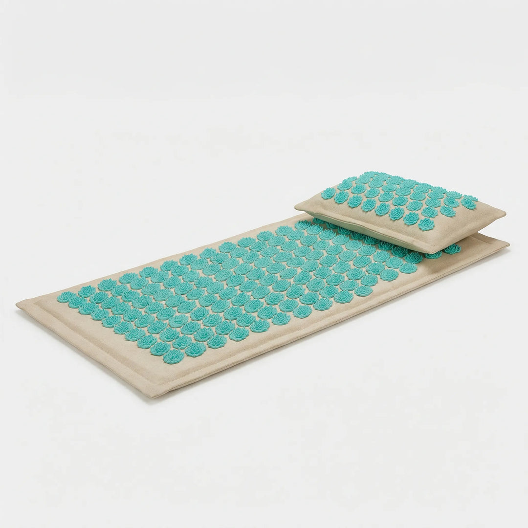 Acupressure mat with pillow, promoting wellness & tension relief for men & women's self-care.