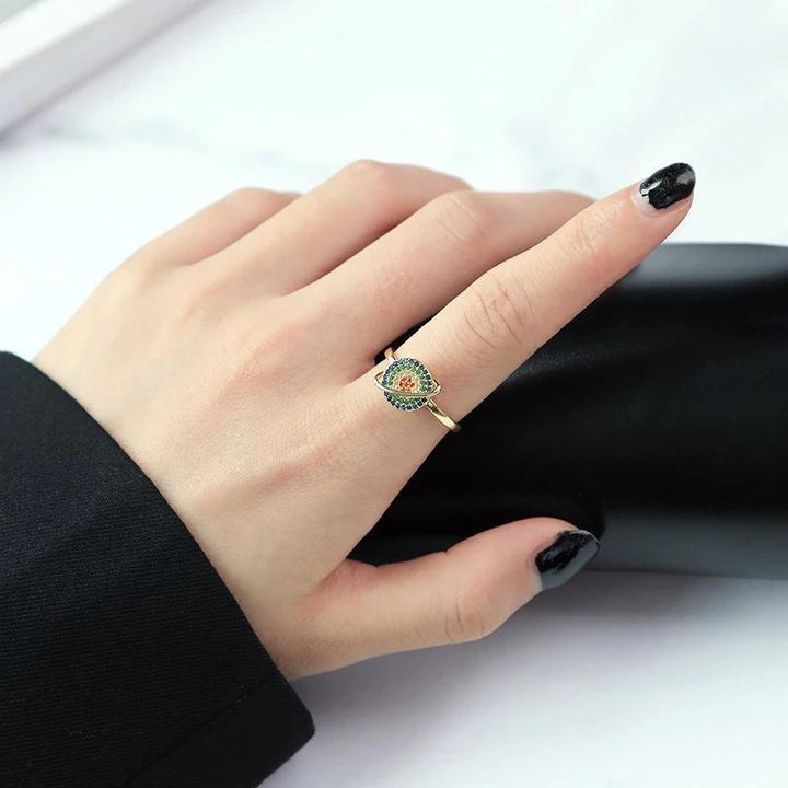 Top-down view of an adjustable galaxy spinner ring, displaying the cosmic pattern and smooth spinning feature