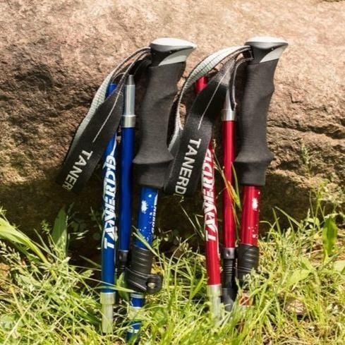 Close-up of unisex adjustable trekking pole grip & locking mechanism. Durable, ergonomic hiking stick for trails.