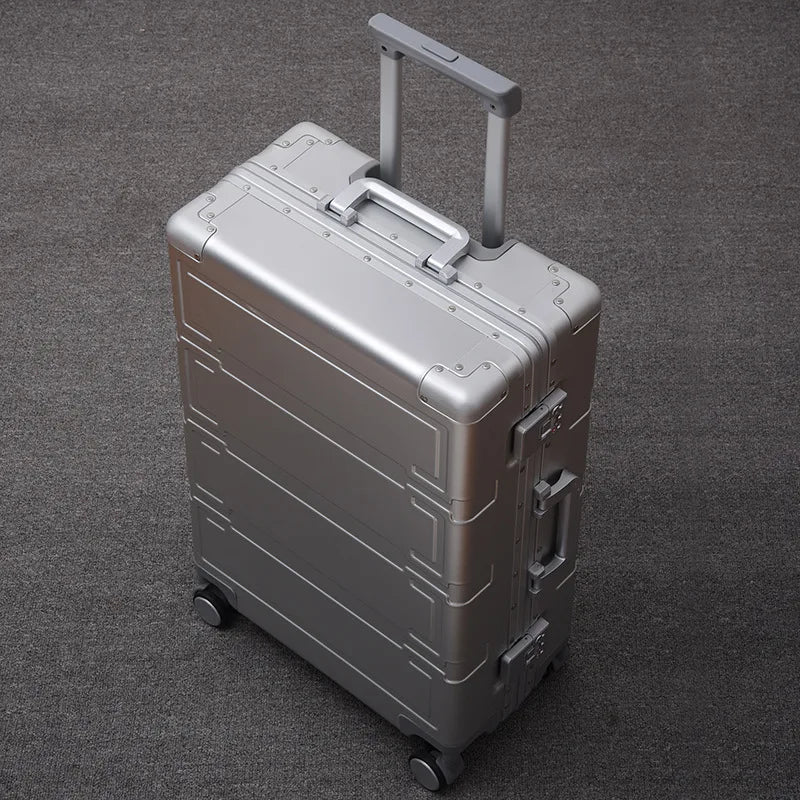 Unisex aluminum hard shell suitcase for durable, lightweight travel.