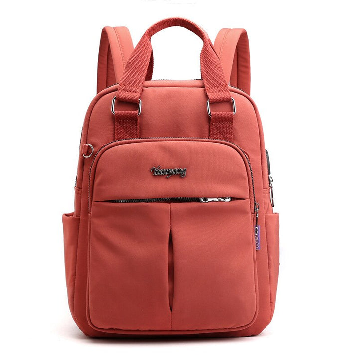 Durable nylon anti-theft work & college backpack, water-resistant, with practical USB charging.