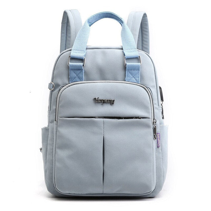 Black water-resistant nylon anti-theft backpack with external USB charging. Ideal for commuters.