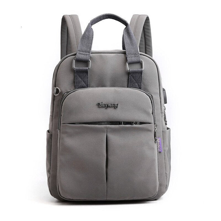 Secure multi-compartment anti-theft travel backpack. Features water-resistance & USB charging.