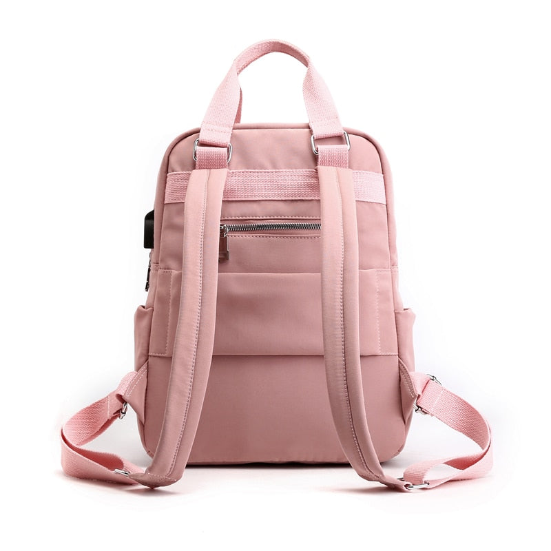 Versatile unisex daily use backpack, water-resistant, anti-theft & USB charging for work/college.