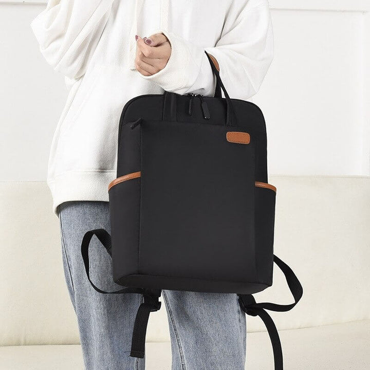 Practical anti-theft travel backpack. Water-resistant Oxford, lightweight, with comfortable straps.
