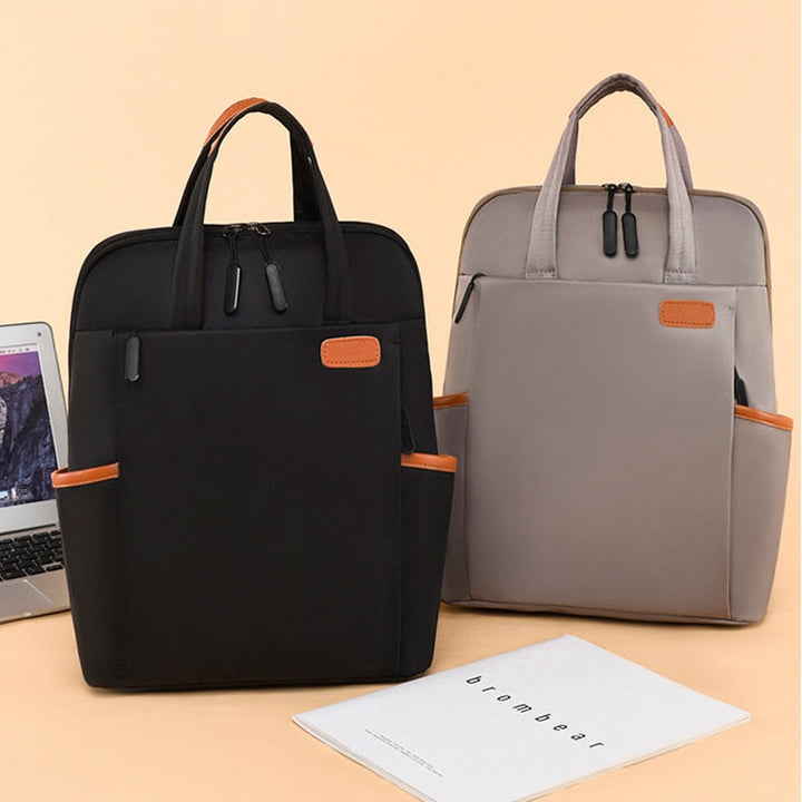 Anti-theft school backpack. Water-resistant & lightweight Oxford design, secure for books & laptop.