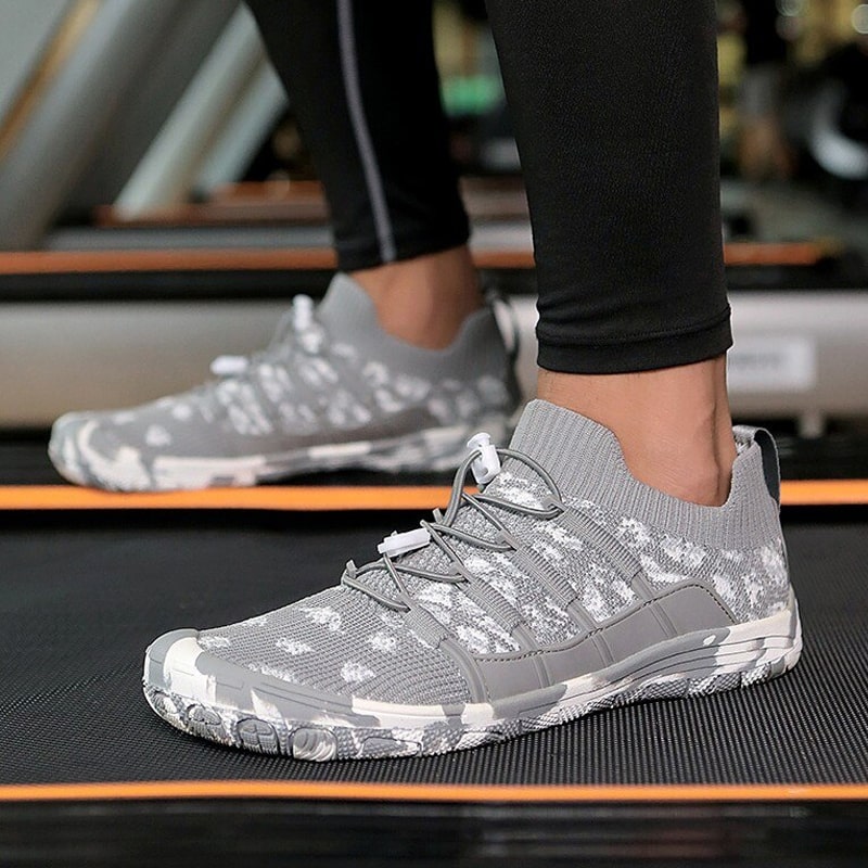Flexible Auron sports shoes with non-slip sole, unisex design for natural movement & active lifestyle.