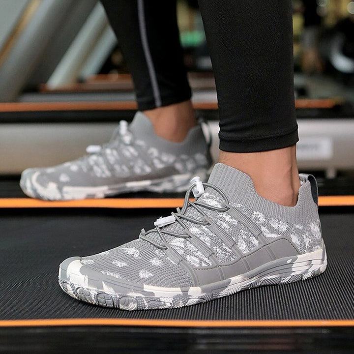 Flexible Auron sports shoes with non-slip sole, unisex design for natural movement & active lifestyle.