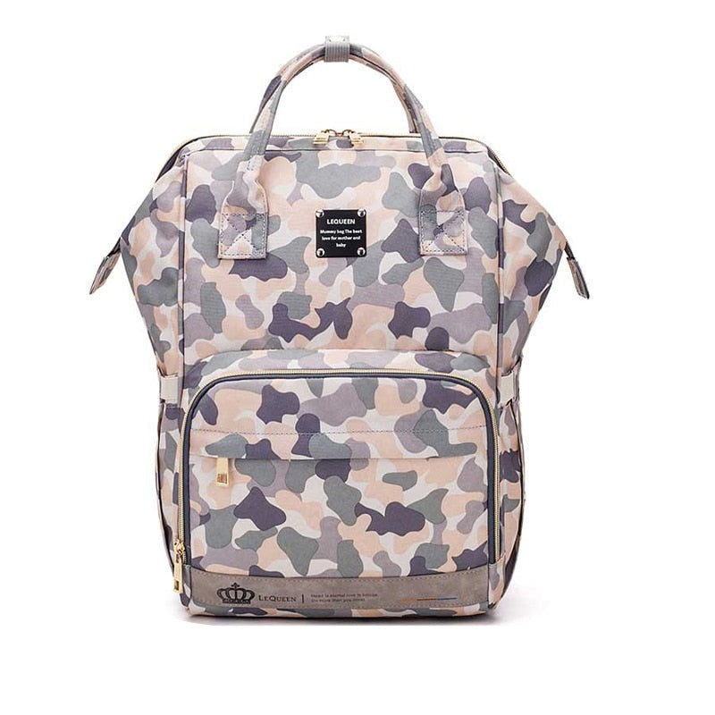 Multi-pocket waterproof diaper backpack, ideal for organized mom & dad baby essentials on the go.