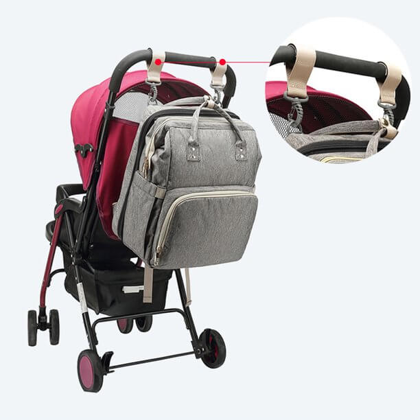 Modern unisex nappy bag backpack converts to a convenient portable bassinet for all parents.