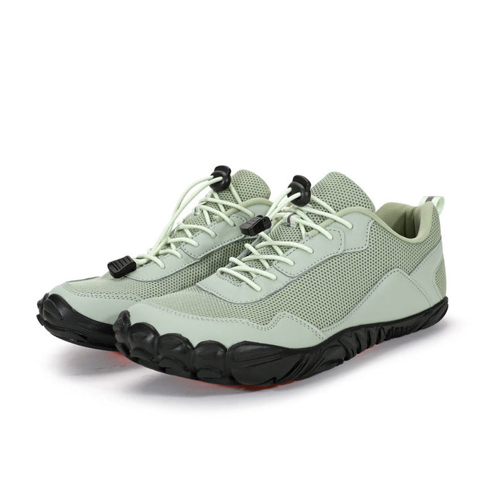 Close-up of flexible zero-drop sole on orthopedic hiking shoes, enhancing natural fit for walking.