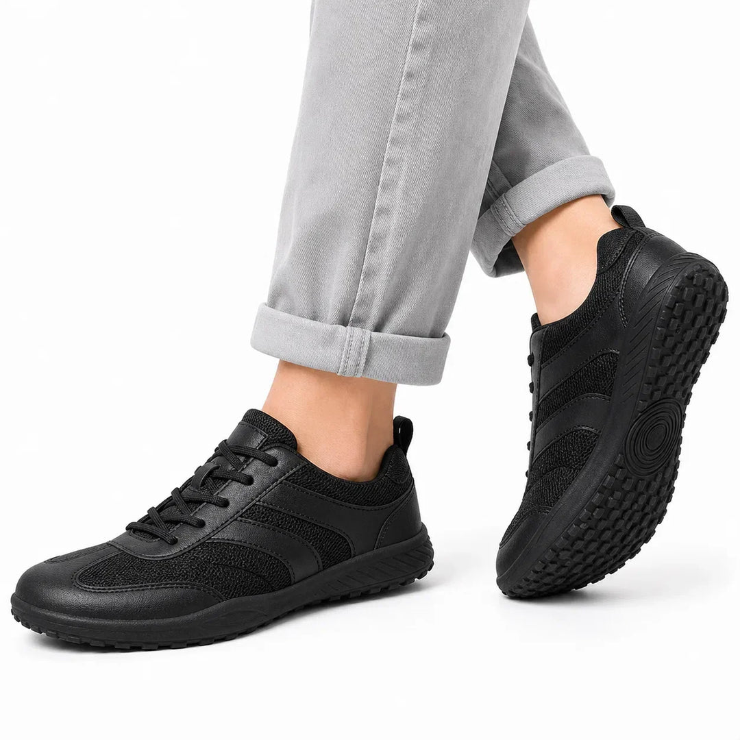 Unisex minimalist footwear, flexible sole, non-slip grip, promoting natural foot strength.