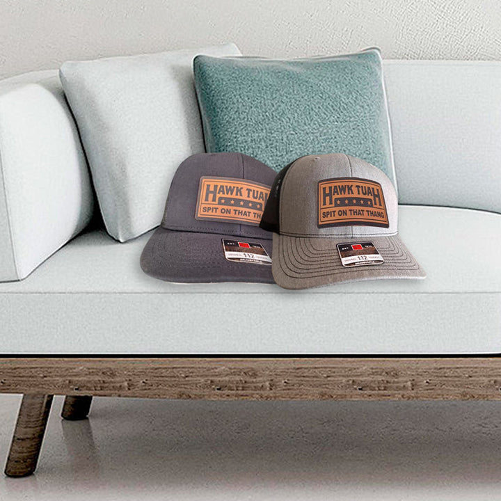 Back view of a grey cotton dad hat, showcasing the adjustable strap for a perfect fit