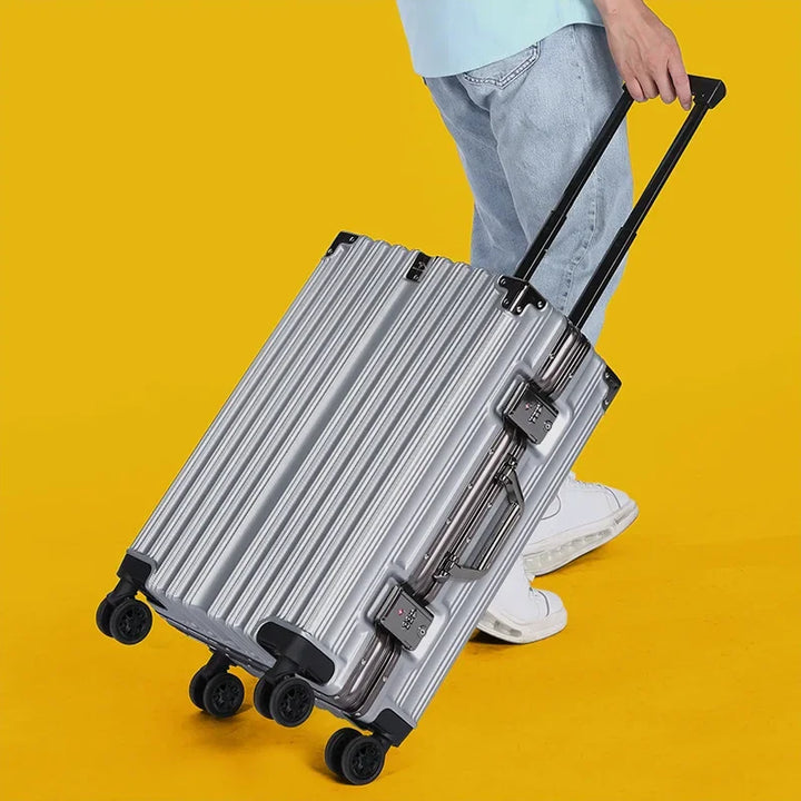 Heavy-duty black hardshell suitcase with robust aluminum frame, built for frequent, secure unisex travel.