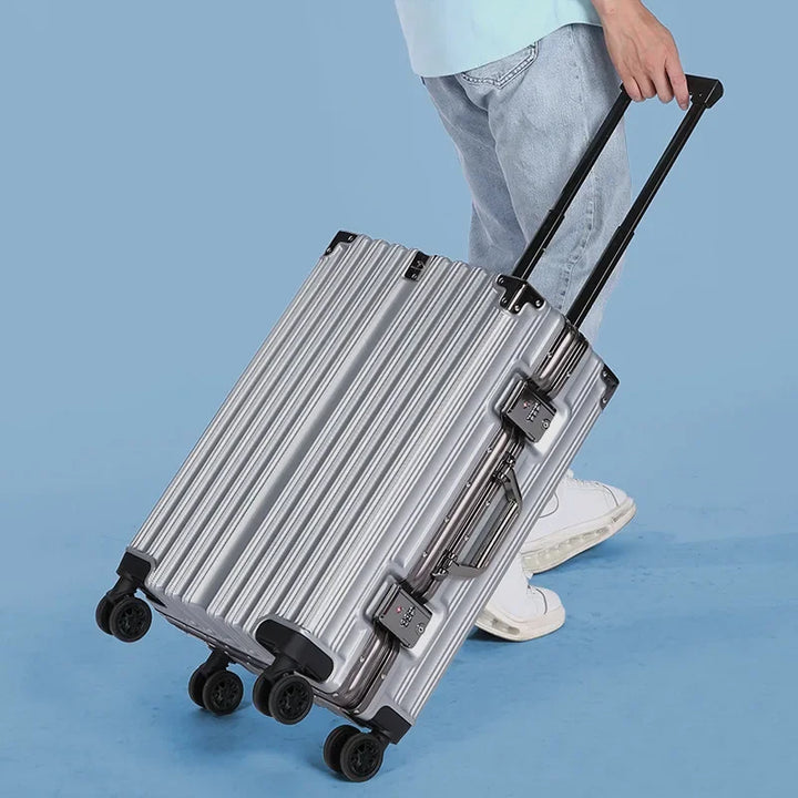 Spacious interior of black hardshell suitcase, organized with divider pockets for efficient unisex packing.