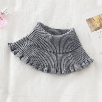 Packaging of a unisex knit dickey collar, ready for gifting this winter season