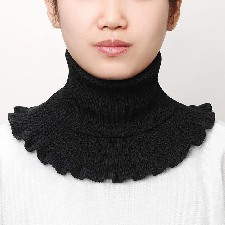 Texture shot of a soft, ribbed knit dickey collar, ideal for layering and warmth