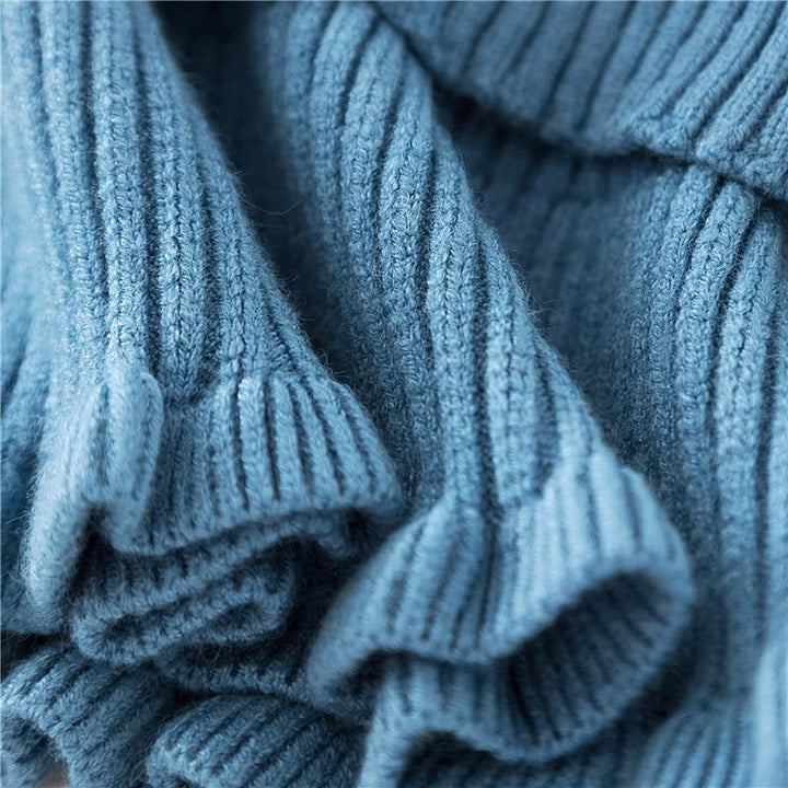 Knit dickey collar on a mannequin, highlighting its comfortable false collar design