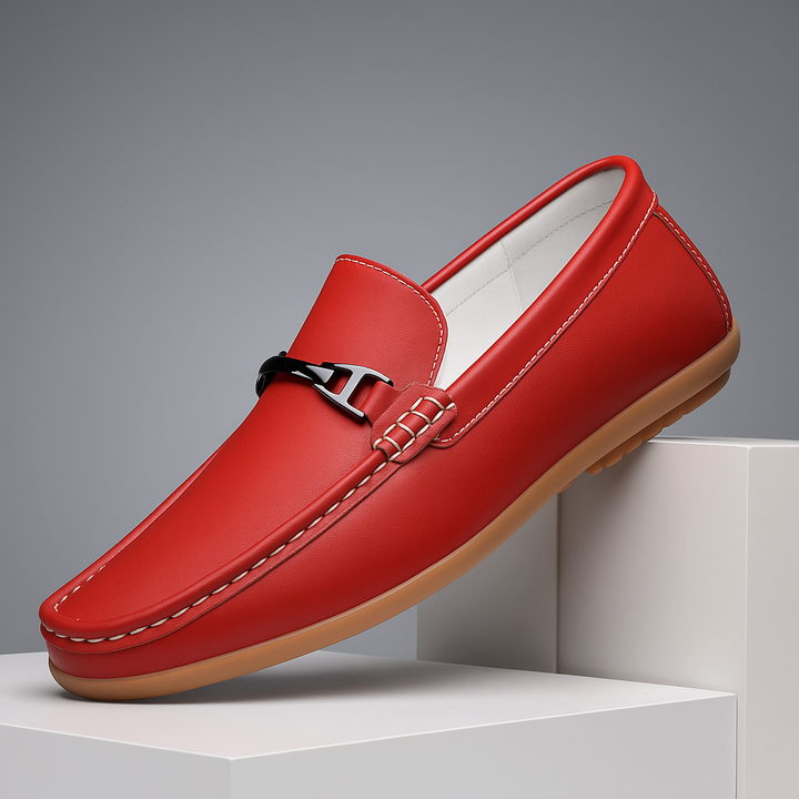 Unisex black leather loafers, classic slip-on design for men and women, comfort and style.