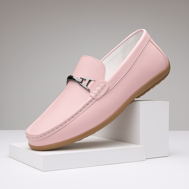 Woman wearing unisex brown leather loafers with casual attire, showing their comfort and versatility.