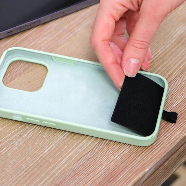 Studio shot of the phone lanyard and pouch, highlighting its durable materials and universal design.