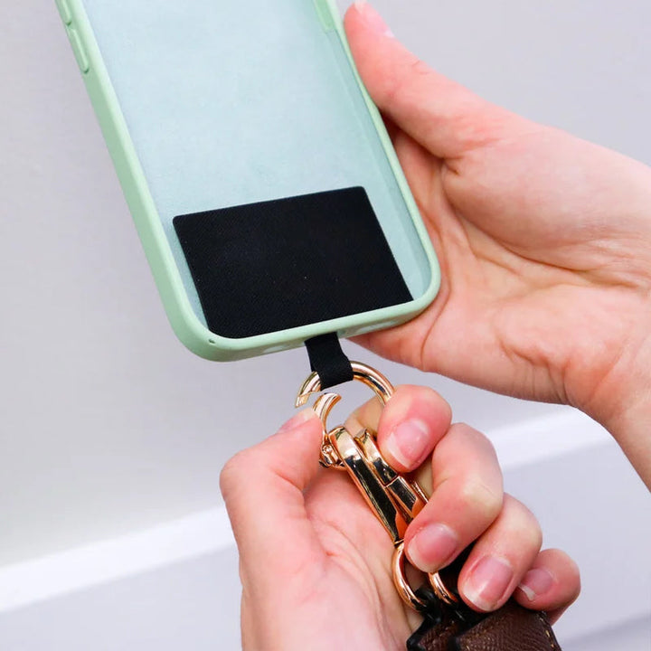Universal phone lanyard in grey, with a detachable pouch, perfect for hands-free carrying mobile devices.