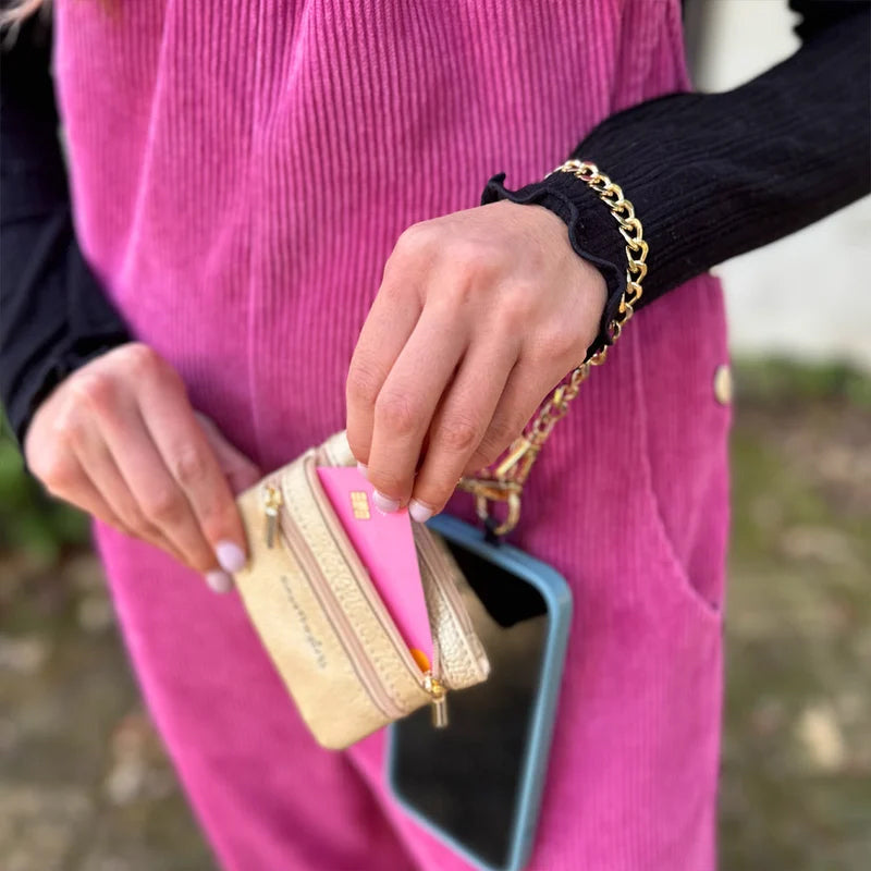 Universal phone lanyard in a vibrant color, featuring a practical pouch for quick access to essentials.