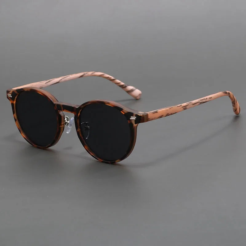Durable unisex sunglasses with UV400 protection, essential eyewear for outdoor activities