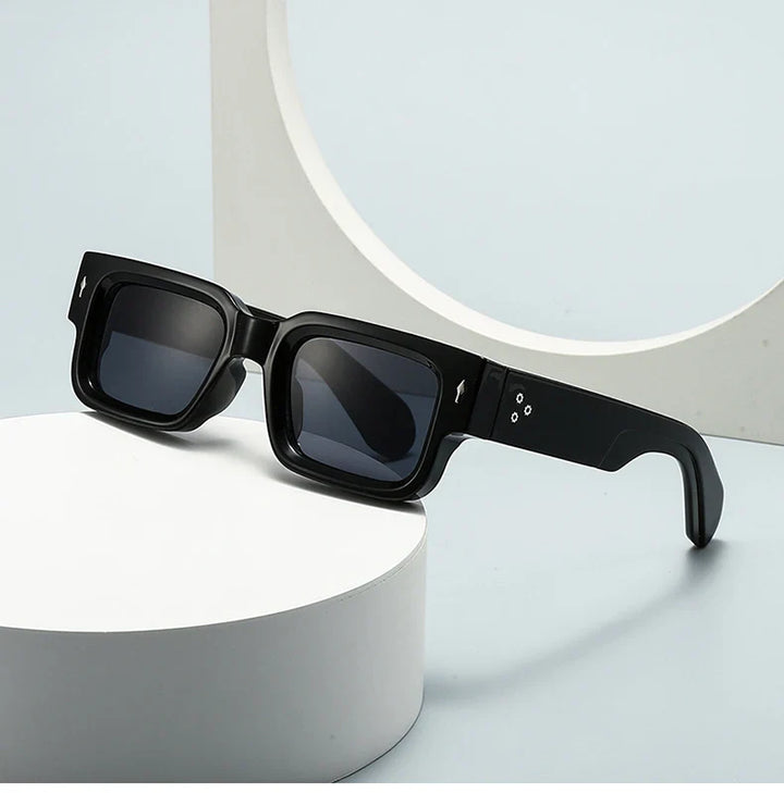 Modern unisex rectangular sunglasses featuring dark lenses and UV protection